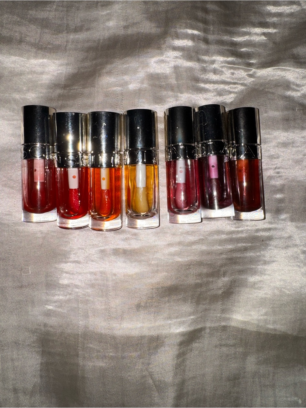 Clarins Mini Lip Gloss Set in Red, Orange, Yellow, Pink, Purple, Brown